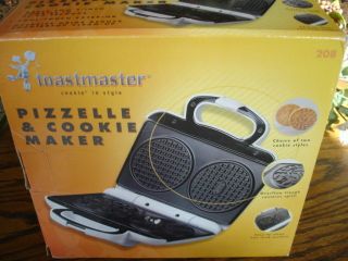 TOASTMASTER PIZZELLE & COOKIE MAKER w/BOX AND INSTRUCTIONS USED ONCE
