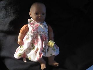 Berenguer African American Baby Doll with yellow dummypacifier