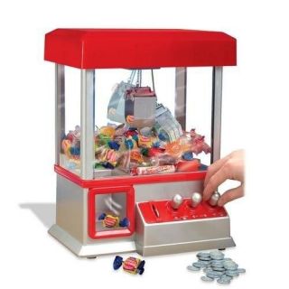 NEW The Claw Electronic Candy Grabber Machine Arcade Game Theme 