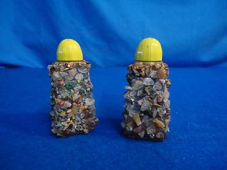   Rock Pebble Covered Salt and Pepper Shaker Yellow Cap Clear Glass