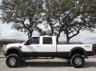   V8 4X4 LIFTED LEATHER POWER OPTS SUNROOF NAVIGATION MOTO METAL WHEELS