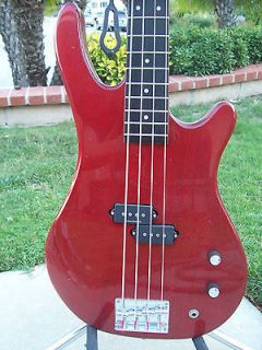   Bass Pickups on Transparent Red Abilene Bass Guitar New String