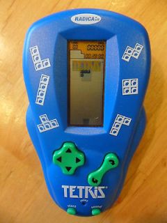 RADICA TETRIS ELECTRONIC HAND HELD GAME IN NICE USED WORKING CONDITION
