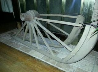 Antique handmade wagon wheel sleds