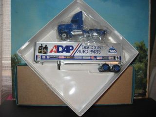 WINROSS 1/64 ADAP DISCOUNT AUTO PARTS TRACTOR AND TRAILER *