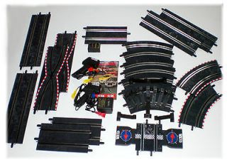 SCX 143 Slot Car Racing Track 34 Pcs with Transformer & Controllers 