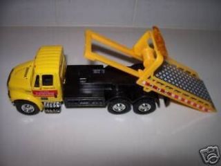International Yellow Flatbed Tow Truck Functional Rollback 1/64 Scale 