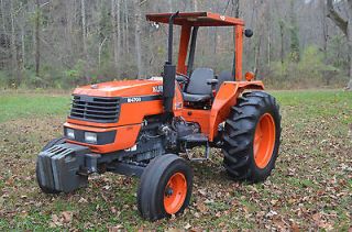 Kubota M 4700 2  wheel drive very low hours with rops