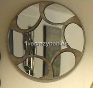 large round silver wall mirror