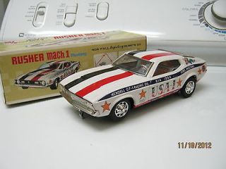 Rusher Mustang Mach1 bumpgo tin model car with box