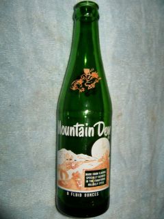 Vintage Mountain Dew Hillbilly w/Gun 8 fl.oz.bottle Itll tickle yore 