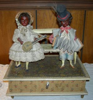 MUSICAL  MECHANICAL  BLACK DOLLS ON A BENCH w/ INSTRUMENTS   ZINNER 
