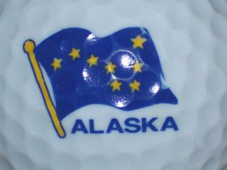 STATE OF ALASKA LOGO GOLF BALL ( gold flag pole )