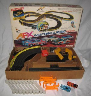 AURORA AFX HO SCALE RACE SET WITH TWO CARS IN ORIGINAL BOX WORKS