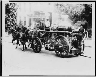 Three firemen,fire engine drawn,horses,equipment,fighters,Washington 