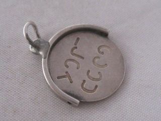 VINTAGE c1960 SILVER SPINNING  GOOD LUCK  CHARM FREE P&P UK