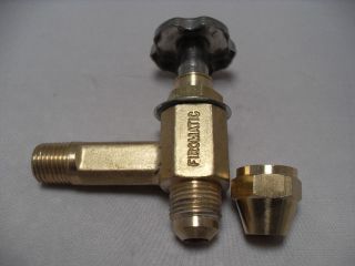 FIREMATIC BRASS ANGLED VALVE WITH FLARE NUT INSTALLED OFF OF BECKETT 