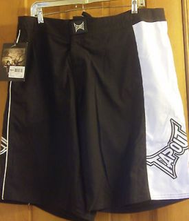 New w/Tags TapouT Black Delta Board Shorts. Size Large.