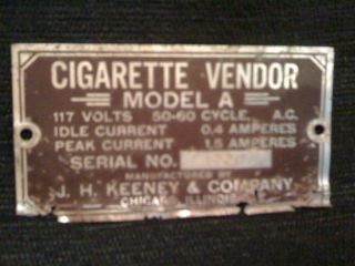 1950 ID Tag from J.H. Keeney & Company Cigarette Machine Model A