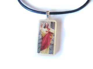buddy christ mini domino pendant with free necklace time left