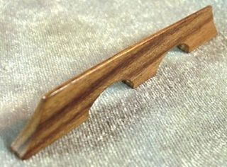very old rosewood bridge for 4 string banjo from canada returns 