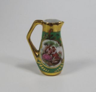 Limoges Miniature Green and Gold Courting Couples Pitcher