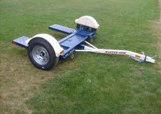   MASTER TOW DOLLY New with one year warranty. Straps included. RV car