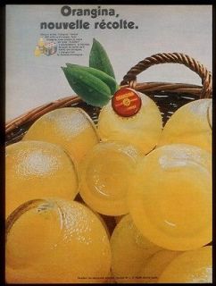 1969 Orangina bottles in basket photo vintage French print ad