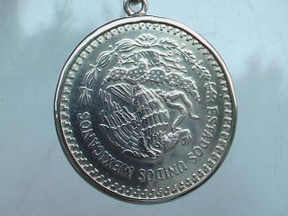 key chain with 1oz mexican 999 fine silver coin from