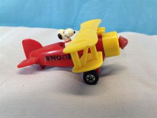 vintage peanuts snoopy diecast bi plane airplane 