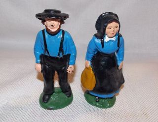 vintage painted cast iron amish man and woman figurines time