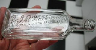 Watkins Co. Clear Glass Small Bottle 5 1/2 tall    stopper top