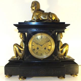 Antique mantel clock black slate Egyptian figure gilt bronze marble 