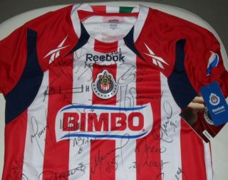    Chivas Home Jersey signed by 2011 Team Michel Bofo Arellano Fabian
