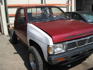 this item is being pulled from the vehicle shown below 1990 nissan d21 