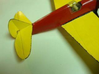 here is a neat balsa wood tether controlled gas powered model airplane 