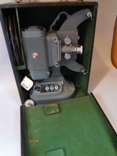 DeJUR 8MM MOVIE PROJECTOR IN CASE with FOUR REELS, TWO BULBS