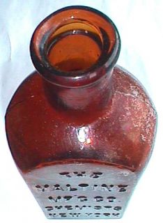  amber colored tombstone shaped antique patent quack medicine bottle 