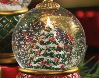 Get seasonal charm with this lighted, musical snow globe. An 