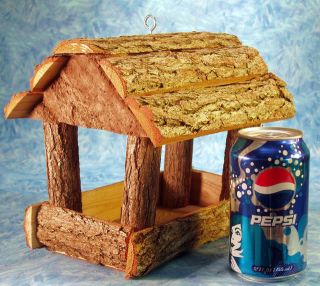 This auction is for One (1) New Hand Made Rustic Bird Feeder.