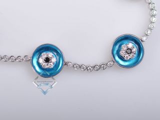 18K White Gold Diamond and Blue Topaz Evil Eye Bracelet
