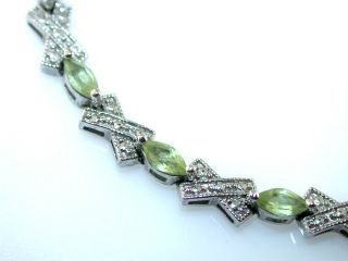 sterling silver bracelet set with marquis shaped peridots measures 7 1 