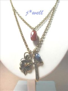  CRYSTAL CROSS & OIL LAMP W/BROWN GEMSTONE 2 CHAIN GOLD TONE NECKLACE