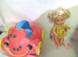   you are bidding on a mattel baby go bye bye doll with bumpety buggy