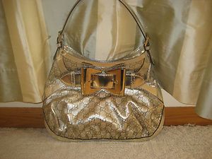 NWT $1650 Gucci Queen Hobo Handbag in metallic gold double Gs leather