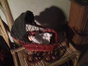 Vintage Wicker Doll Carriage with Porcelain Baby Doll