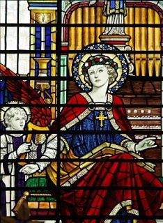 142kb jpg photograph of a stained glass window of Saint Cecilia 