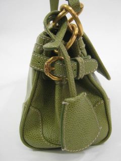 you are bidding on a cece cord green embossed leather shoulder handbag 