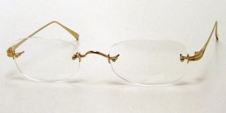 Vera Wang Womens Rimless Titanium Eyeglasses Glisten Gold 52 22 135 