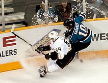 Ryan battles for the puck with Christian Ehrhoff during 2007 pre